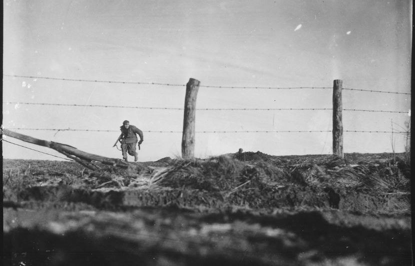 nfantryman goes out on a one-man sortie, covered by a buddy in the background. 82nd Airborne Div., Belgium. Dec. 24, 1944.